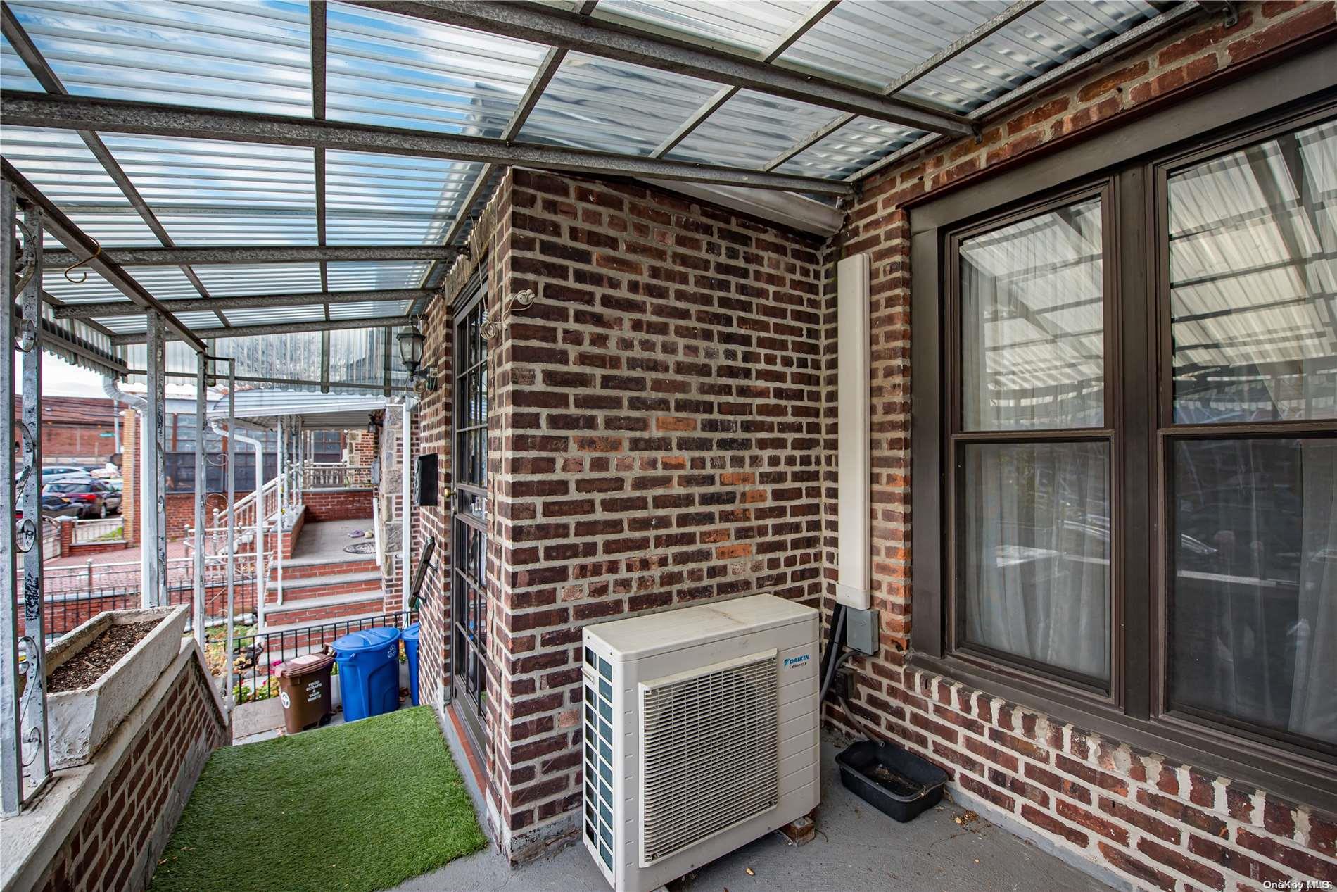 53-15 37th Road Queens, NY 11377 - Photo 25 of 25 a view of an empty room with wooden floor and a window