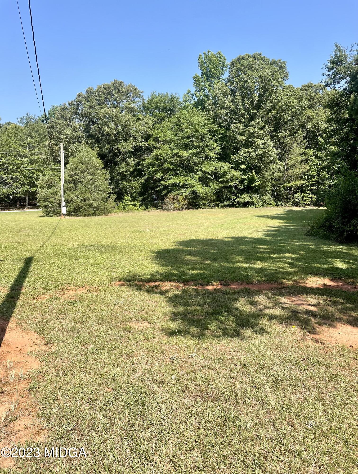 1222 Lassiter Road Forsyth, GA 31029 - Photo 6 of 6 a view of an ocean from a yard