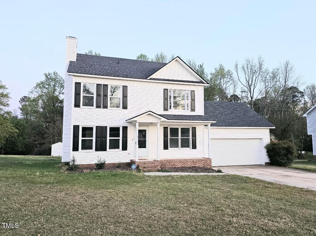 250 Pope Lake Road Angier, NC 27501 - Photo 1 of 8 a front view of a house with a yard