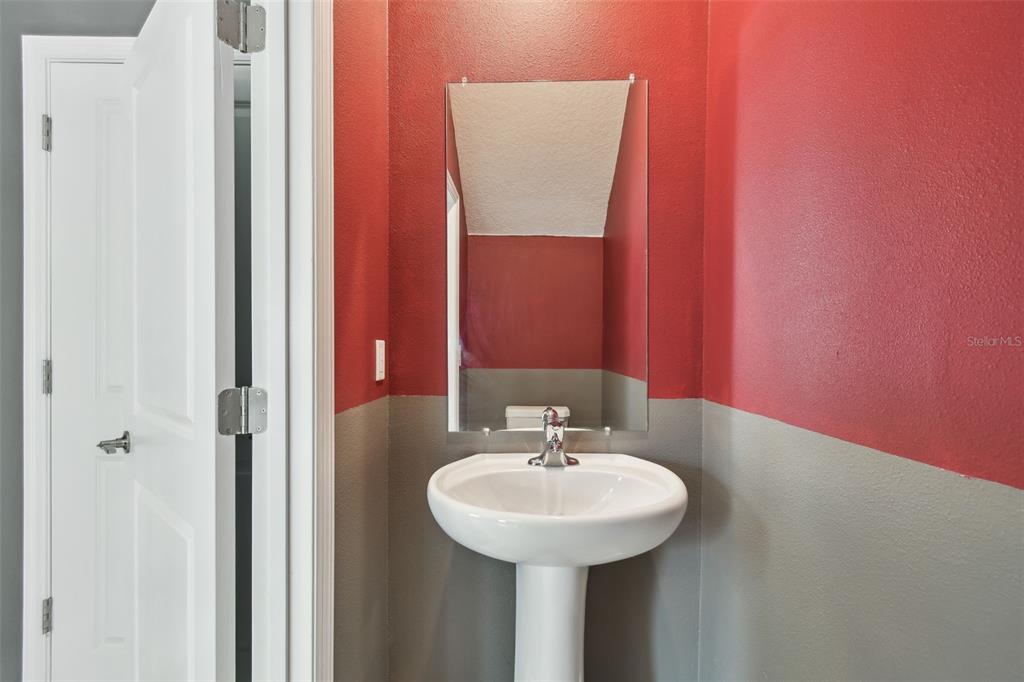 36390 Wl Hl Way Zephyrhills, FL 33541 - Photo 14 of 77 a bathroom with a sink and a mirror