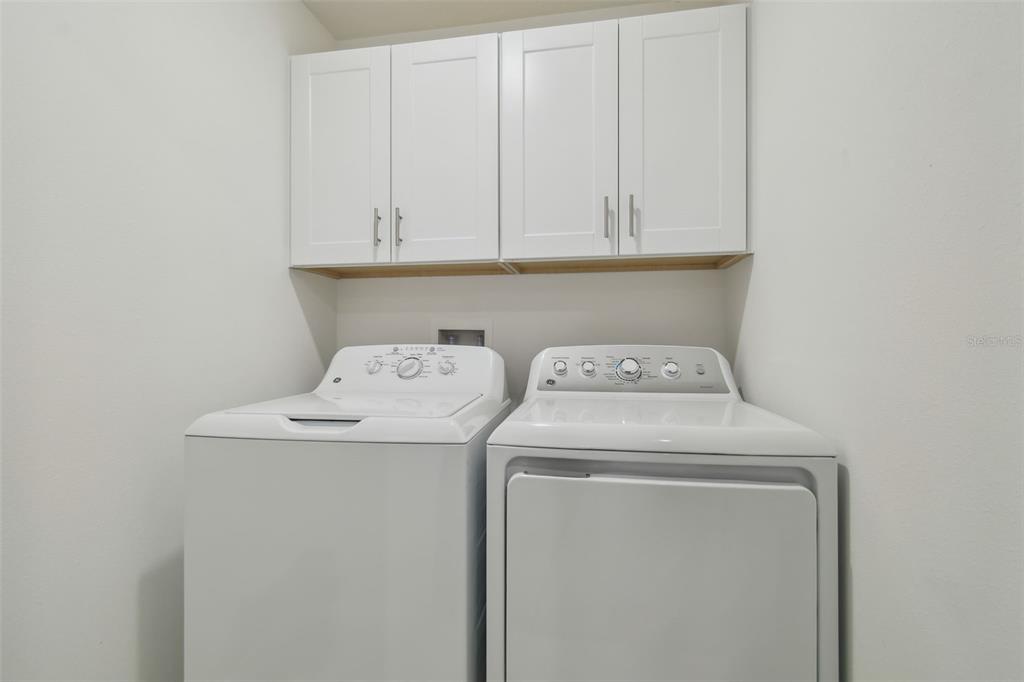 36390 Wl Hl Way Zephyrhills, FL 33541 - Photo 26 of 77 a utility room with dryer and washer