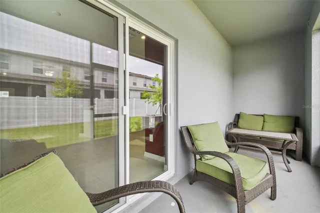 a view of a swimming pool with a yard