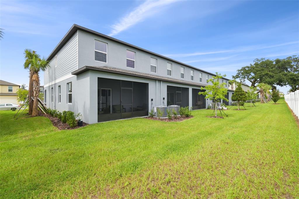 36390 Wl Hl Way Zephyrhills, FL 33541 - Photo 47 of 77 a front view of a house with yard and green space
