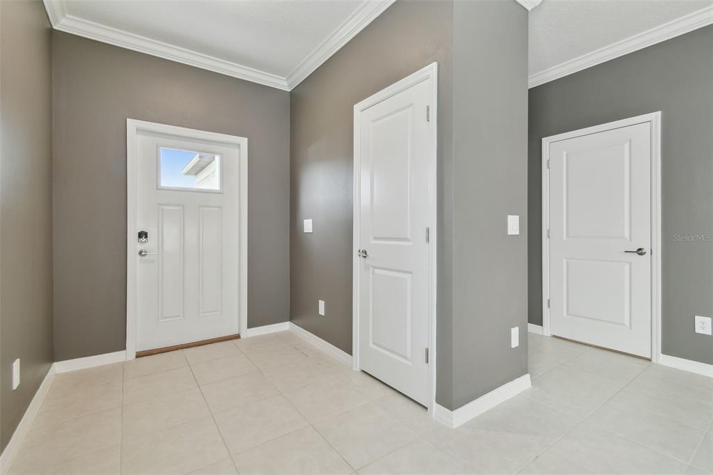 36390 Wl Hl Way Zephyrhills, FL 33541 - Photo 8 of 77 a view of an empty room and closet area