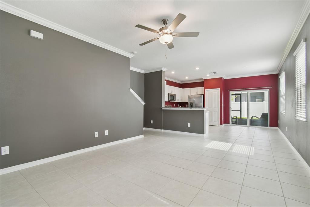36390 Wl Hl Way Zephyrhills, FL 33541 - Photo 10 of 77 a view of an empty room with a kitchen