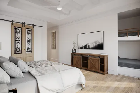 a bedroom with a bed and a dresser