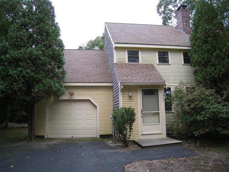22 Quisset Road Centerville, MA 02632 - Photo 2 of 19 a front view of a house with a yard