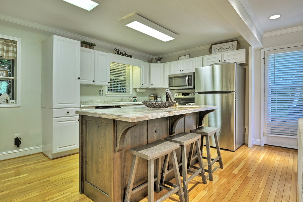 53 Addle Trail Ellijay, GA 30540 - Photo 11 of 50 a kitchen with stainless steel appliances a sink stove and refrigerator
