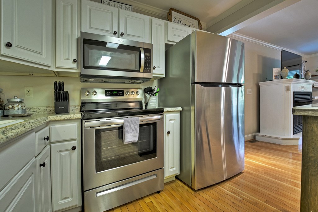 53 Addle Trail Ellijay, GA 30540 - Photo 13 of 50 a kitchen with stainless steel appliances granite countertop a refrigerator stove and sink