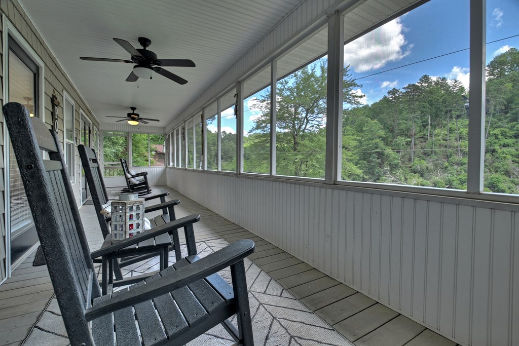 53 Addle Trail Ellijay, GA 30540 - Photo 17 of 50 a view of an chairs in the balcony