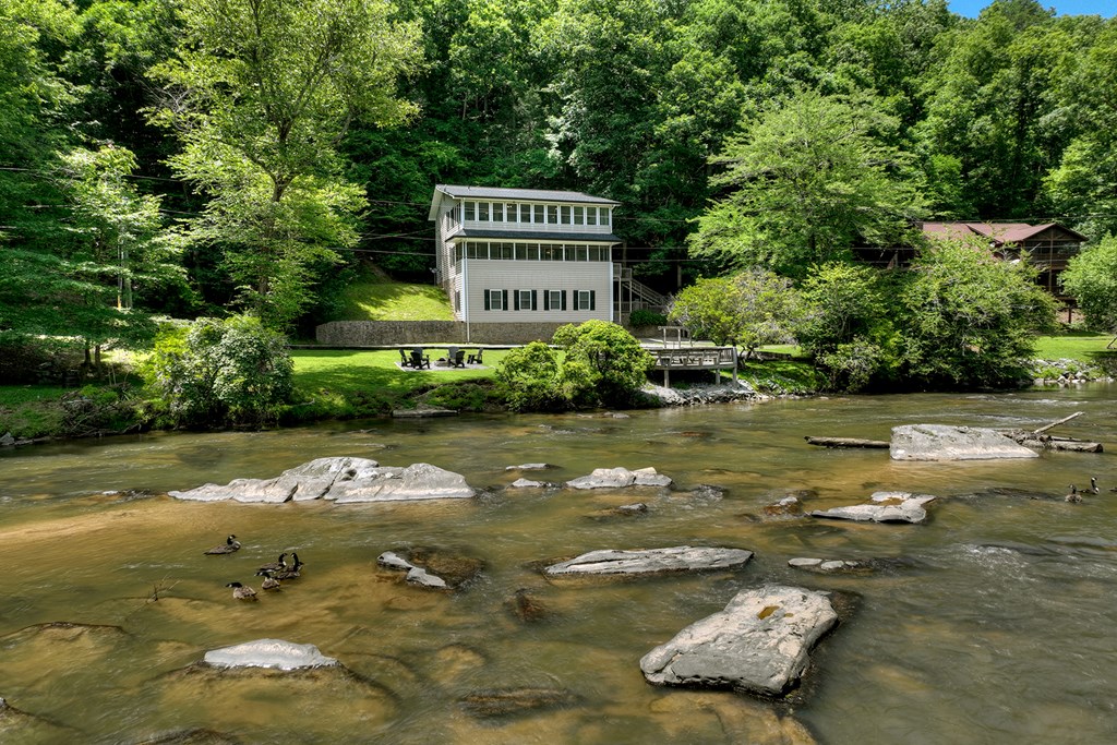 53 Addle Trail Ellijay, GA 30540 - Photo 47 of 50 a view of a water pond with green space