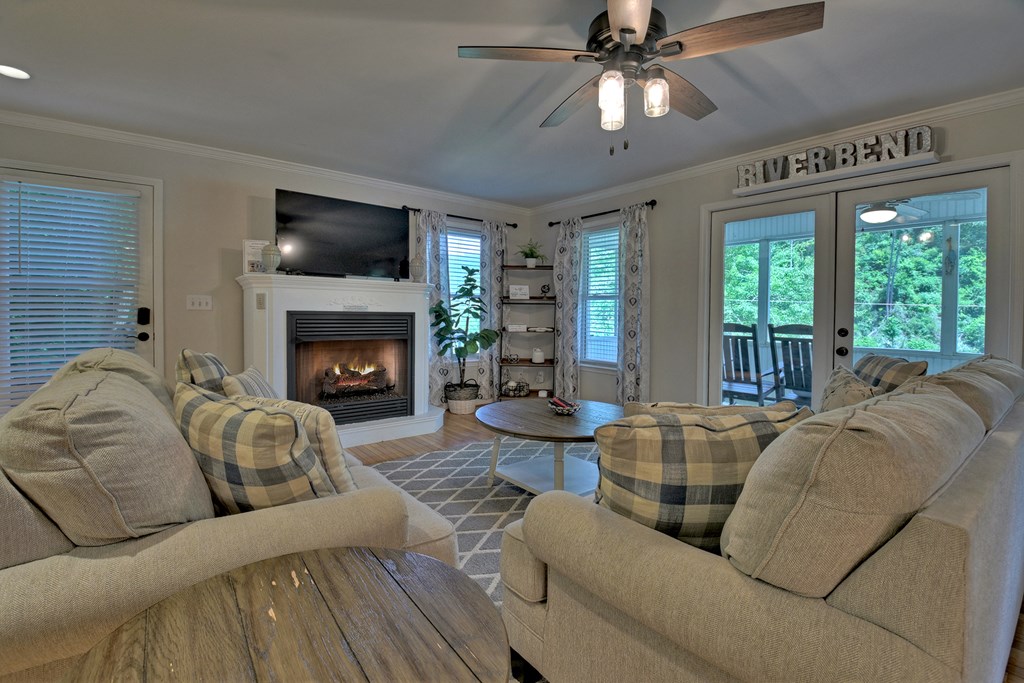 53 Addle Trail Ellijay, GA 30540 - Photo 7 of 50 a living room with furniture and a fireplace