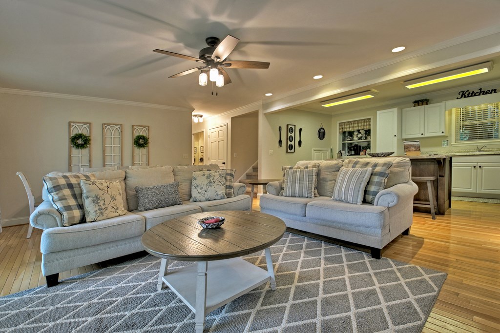 53 Addle Trail Ellijay, GA 30540 - Photo 8 of 50 a living room with furniture and a chandelier