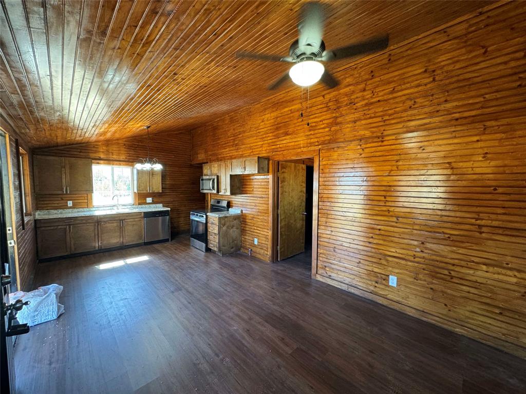 184 County Road Pattonville, TX 75468 - Photo 14 of 20 a view of a kitchen with a sink and cabinets
