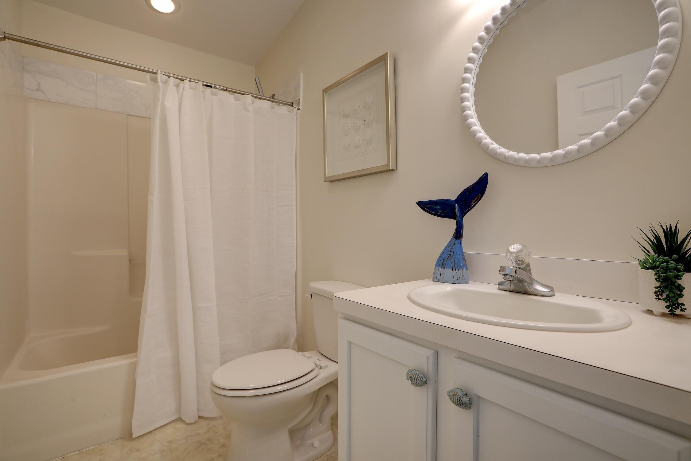 8825 Highway 1 Micco, FL 32976 - Photo 25 of 32 a bathroom with a sink a toilet and shower