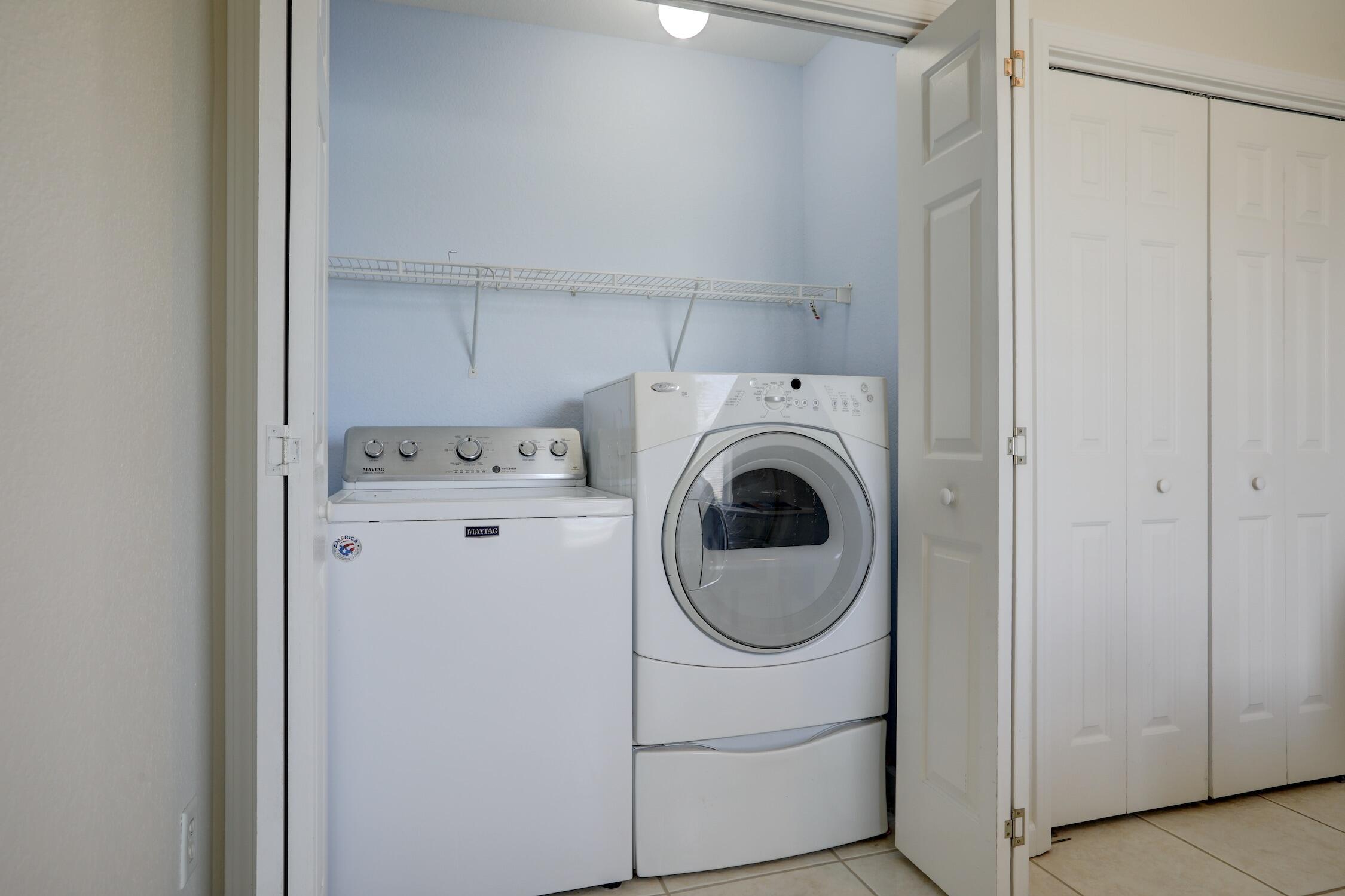 8825 Highway 1 Micco, FL 32976 - Photo 26 of 32 a utility room with dryer and washer