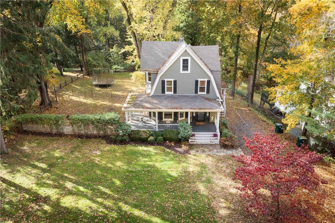 15 Mustato Road Katonah, NY 10536 - Photo 1 of 1 a front view of a house with yard and green space