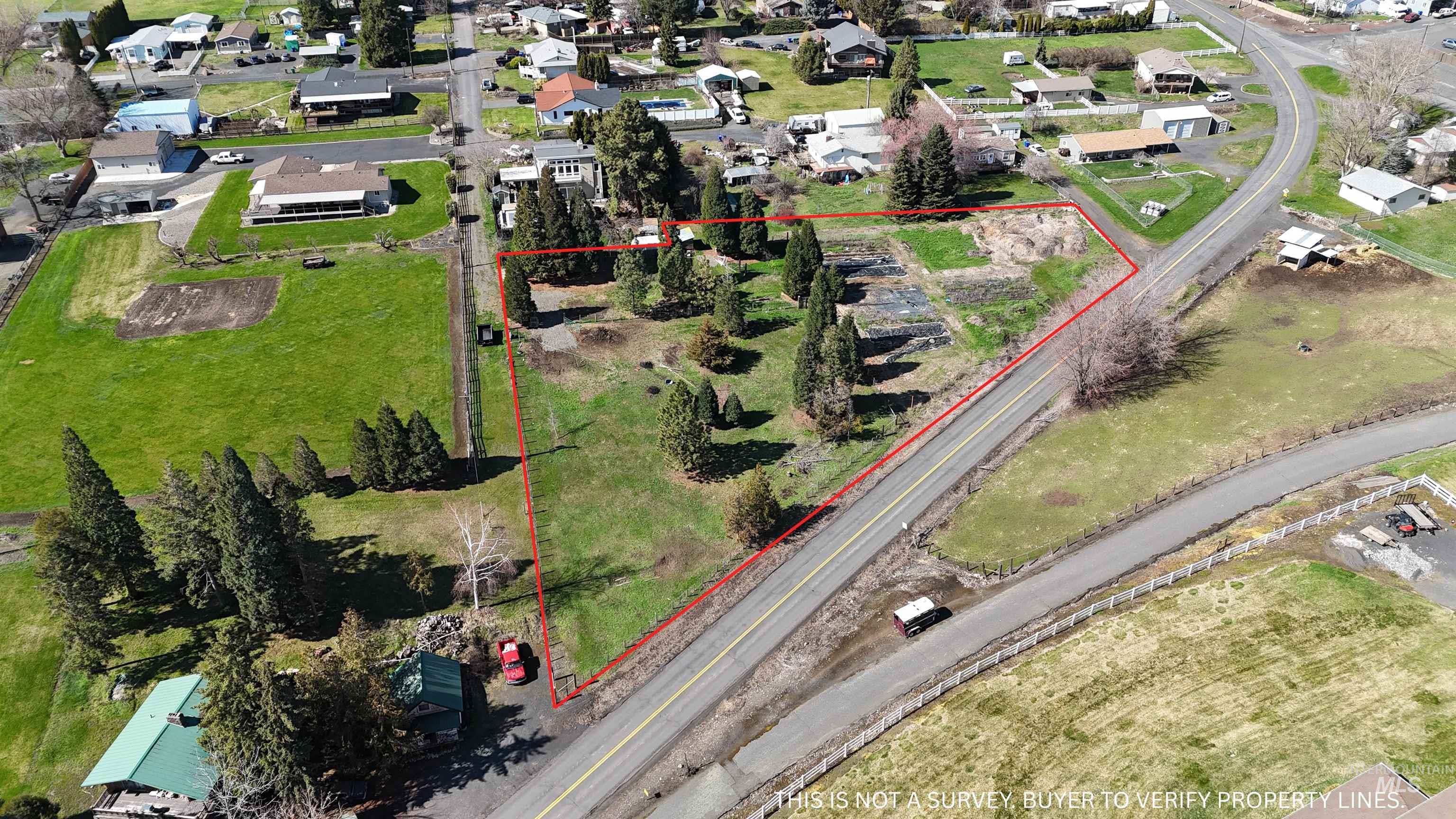 0 Barr Road Lewiston, ID 83501 - Photo 6 of 11 Aerial view of residential area with property parcel outlined