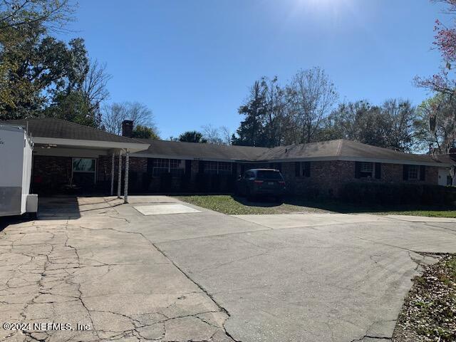 6640 Terry Road Jacksonville, FL 32216 - Photo 2 of 25 a house view with a garden space