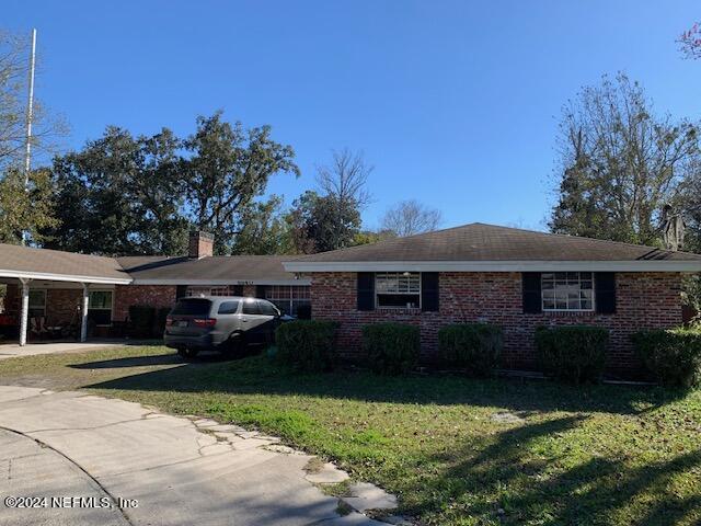 6640 Terry Road Jacksonville, FL 32216 - Photo 3 of 25 front view of a house with yard