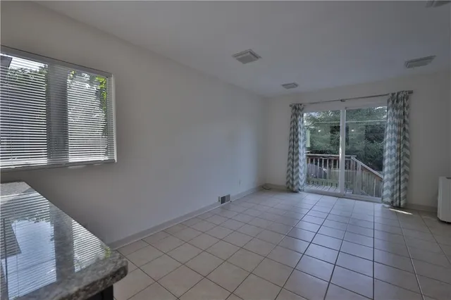 a backyard of a house with lots of green space