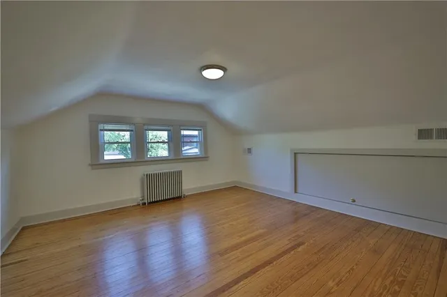 a bathroom with a bath tub and shower