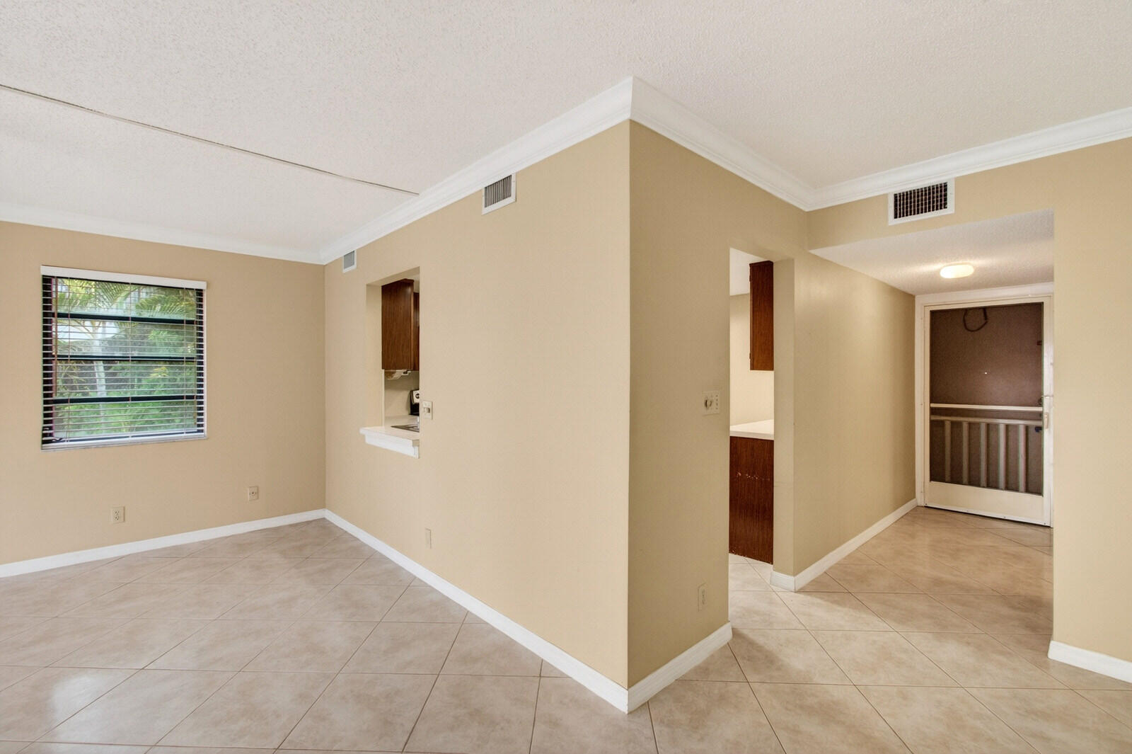 3951 Northeast 19th Road, Unit 1701 Pompano Beach, FL 33064 - Photo 32 of 82 a view of empty room with windows and wardrobe