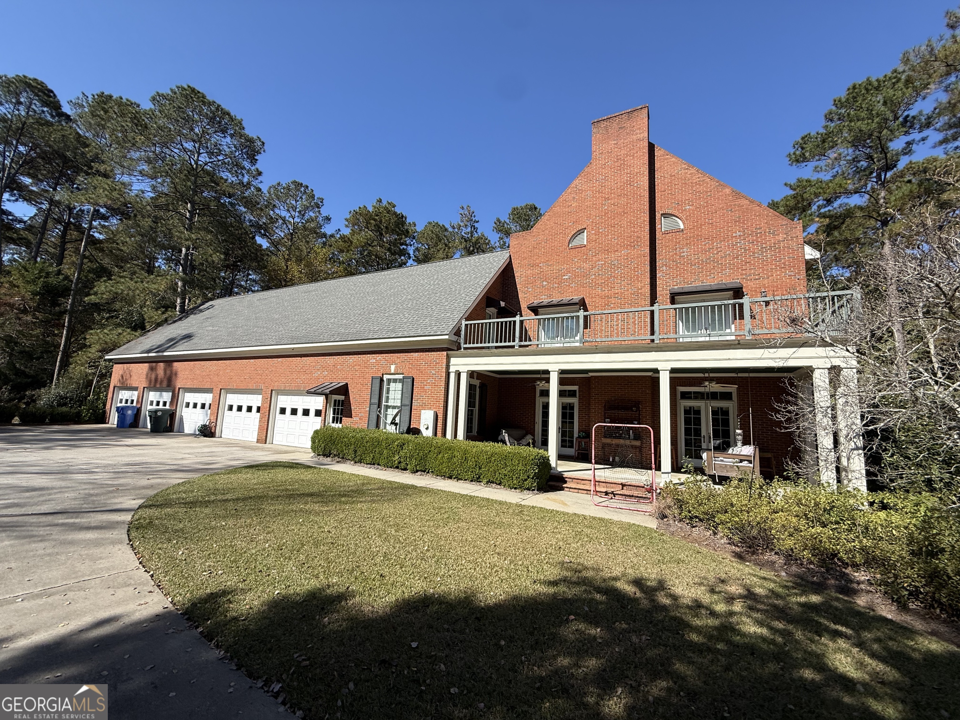 113 Parks Ridge Road Dublin, GA 31021 - Photo 12 of 99 a view of a white house with a yard and potted plants