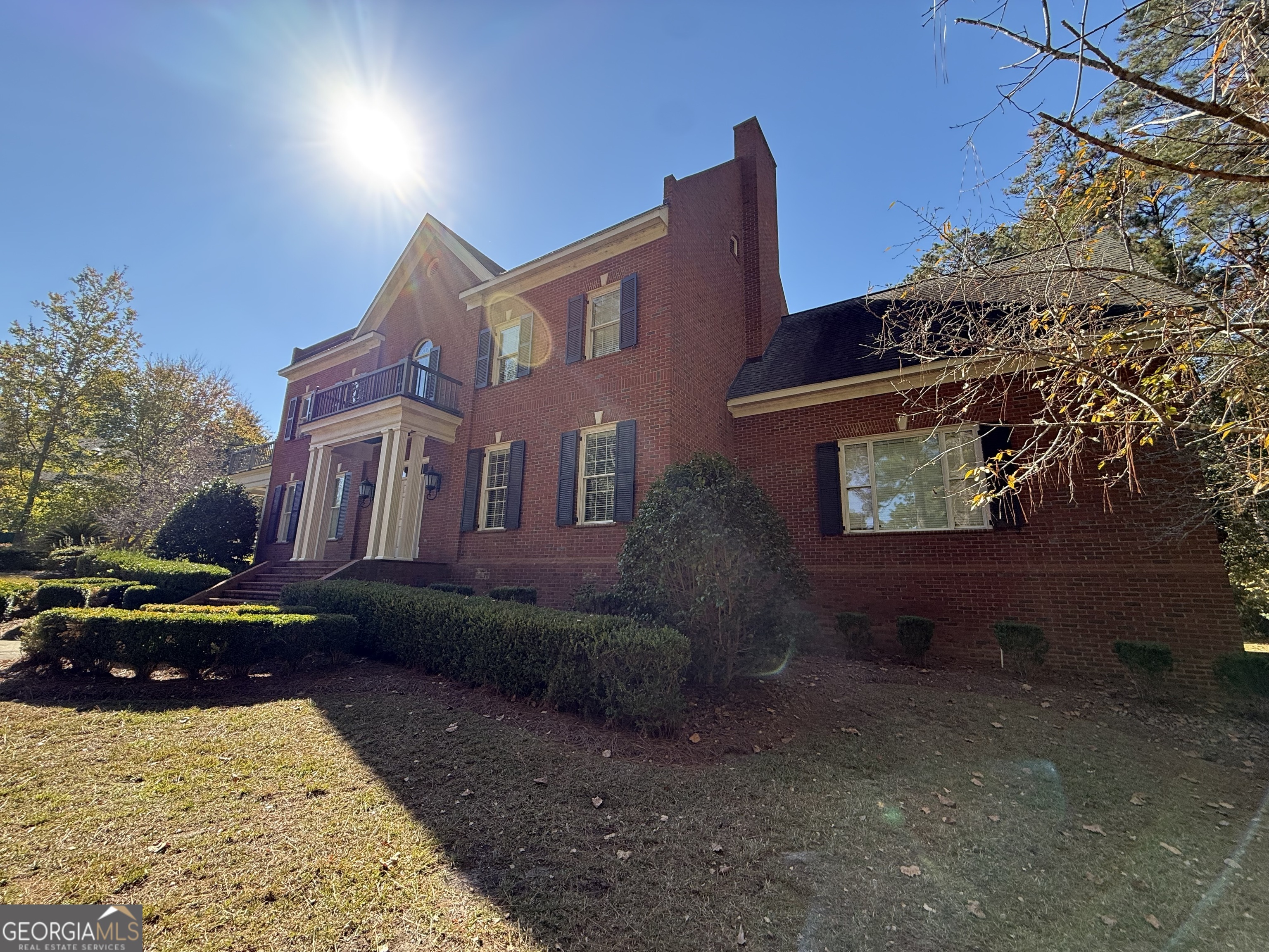 113 Parks Ridge Road Dublin, GA 31021 - Photo 16 of 99 a brick building with a yard in front of it