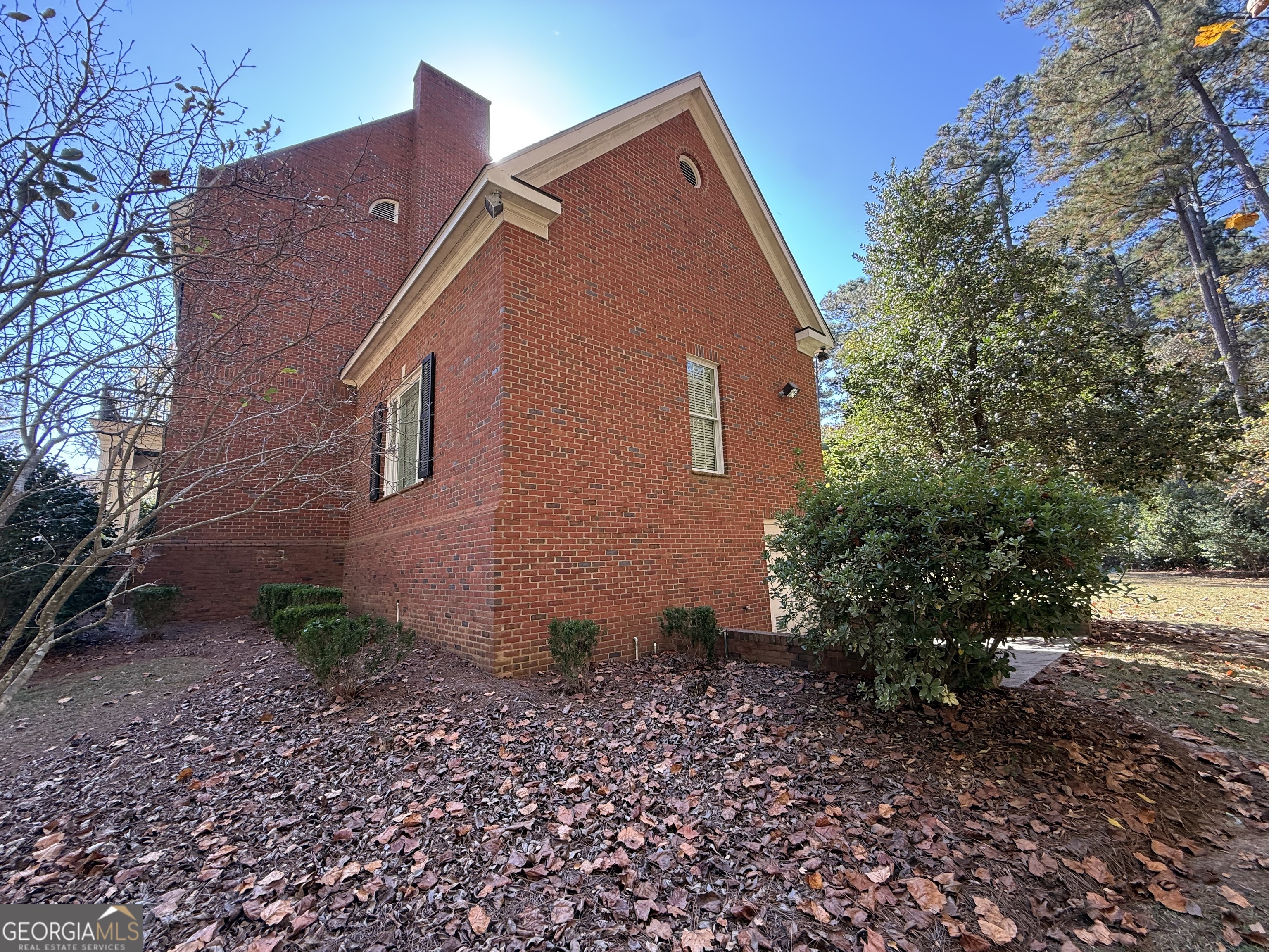 113 Parks Ridge Road Dublin, GA 31021 - Photo 17 of 99 a backyard of a house with lots of green space