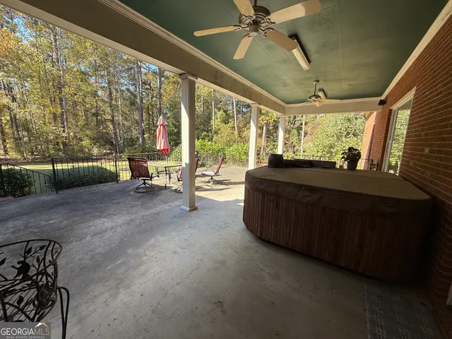 a bed room with furniture and a chandelier