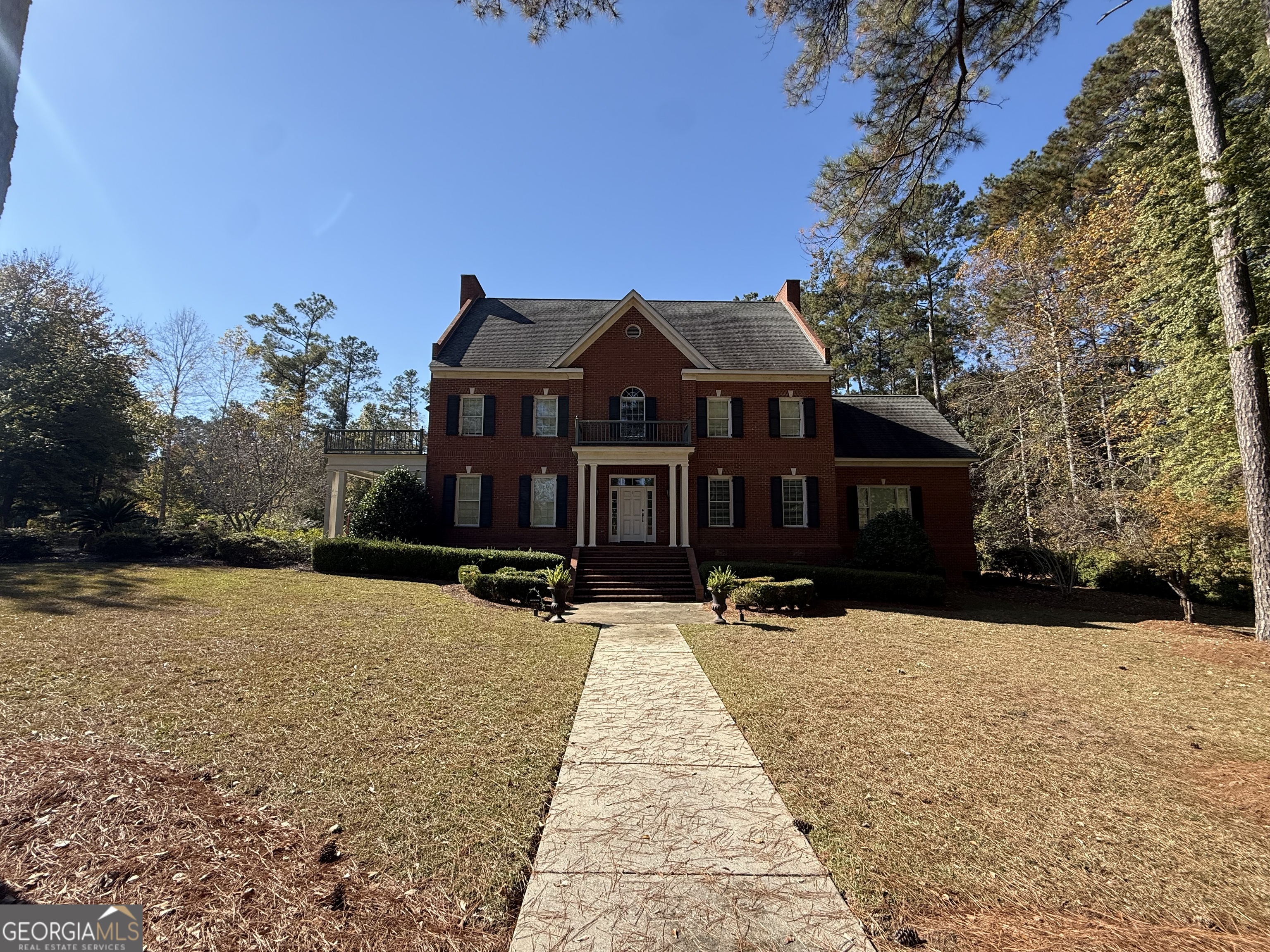 113 Parks Ridge Road Dublin, GA 31021 - Photo 5 of 99 a front view of house with yard covered in snow