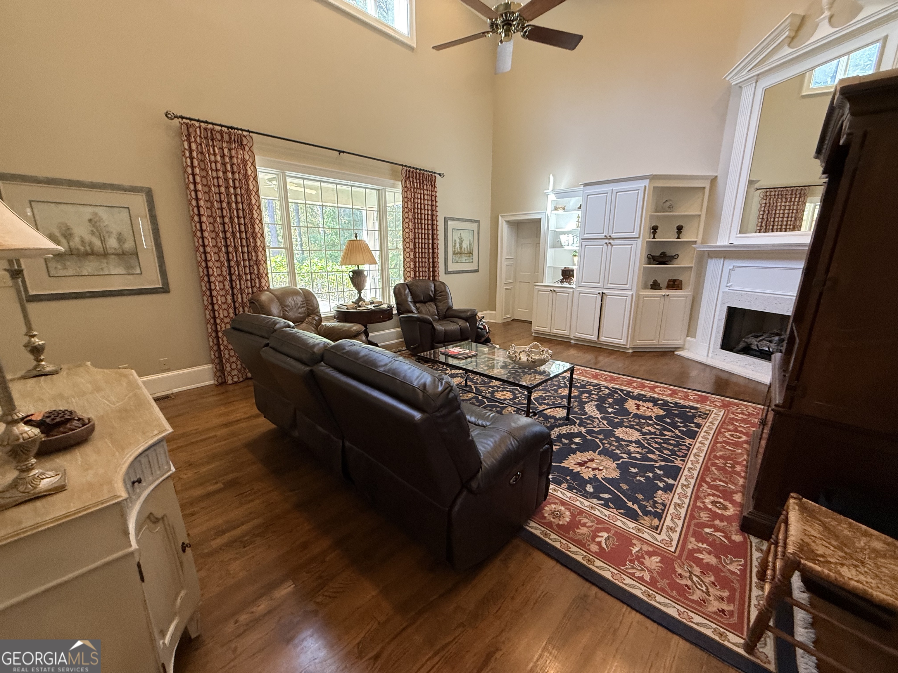 113 Parks Ridge Road Dublin, GA 31021 - Photo 54 of 99 a living room with furniture windows and a fireplace