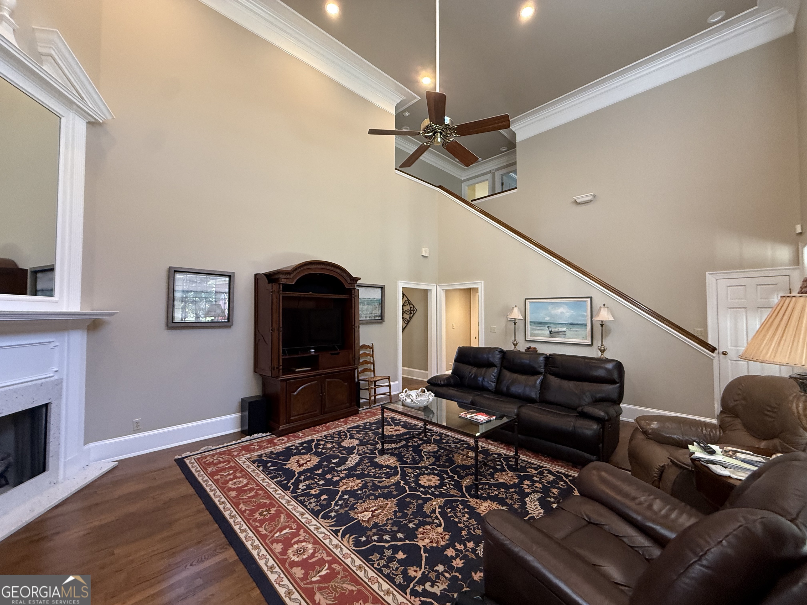 113 Parks Ridge Road Dublin, GA 31021 - Photo 57 of 99 a living room with furniture and a fireplace