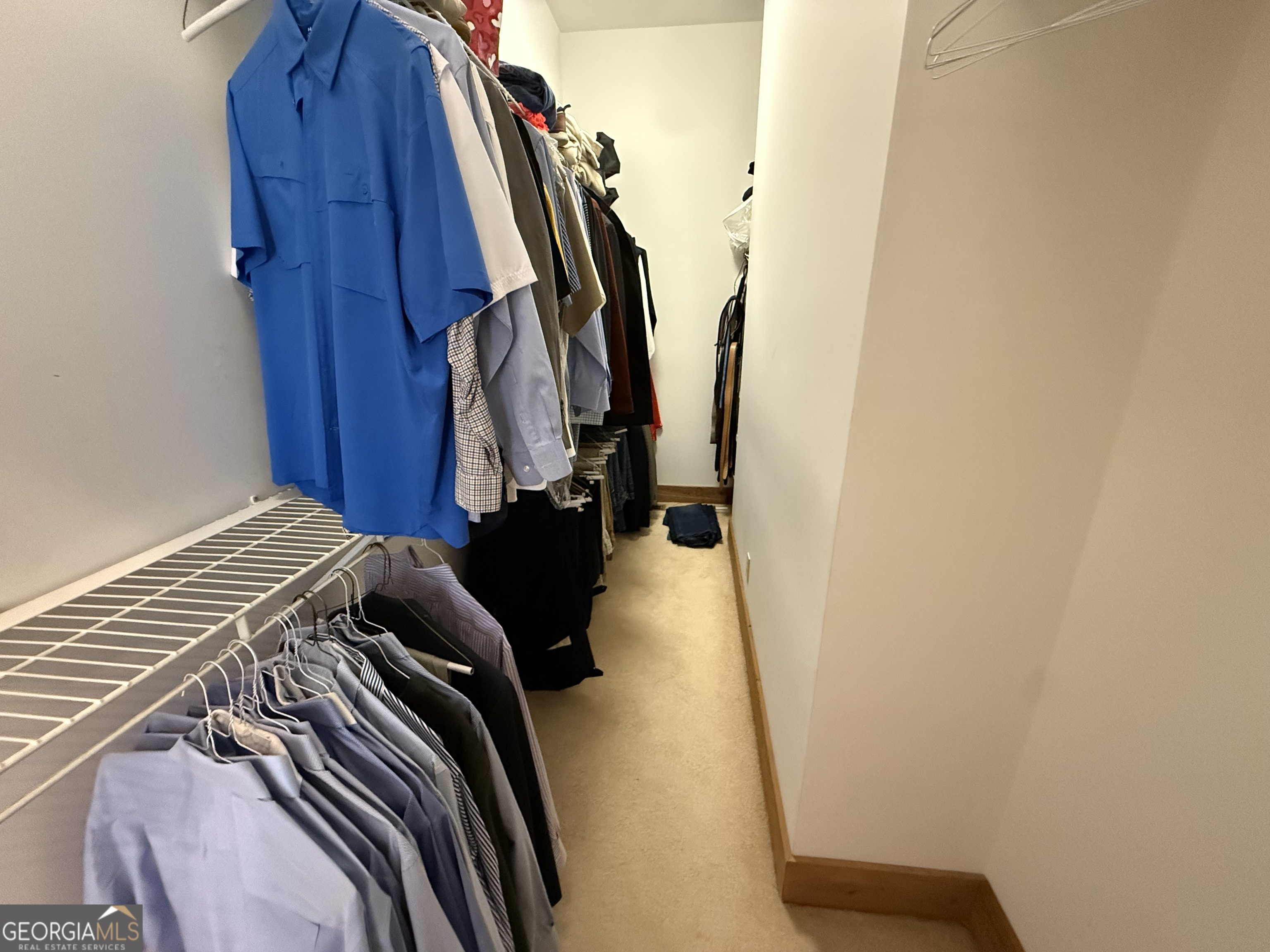 113 Parks Ridge Road Dublin, GA 31021 - Photo 62 of 99 a view of walk in closet with clothes