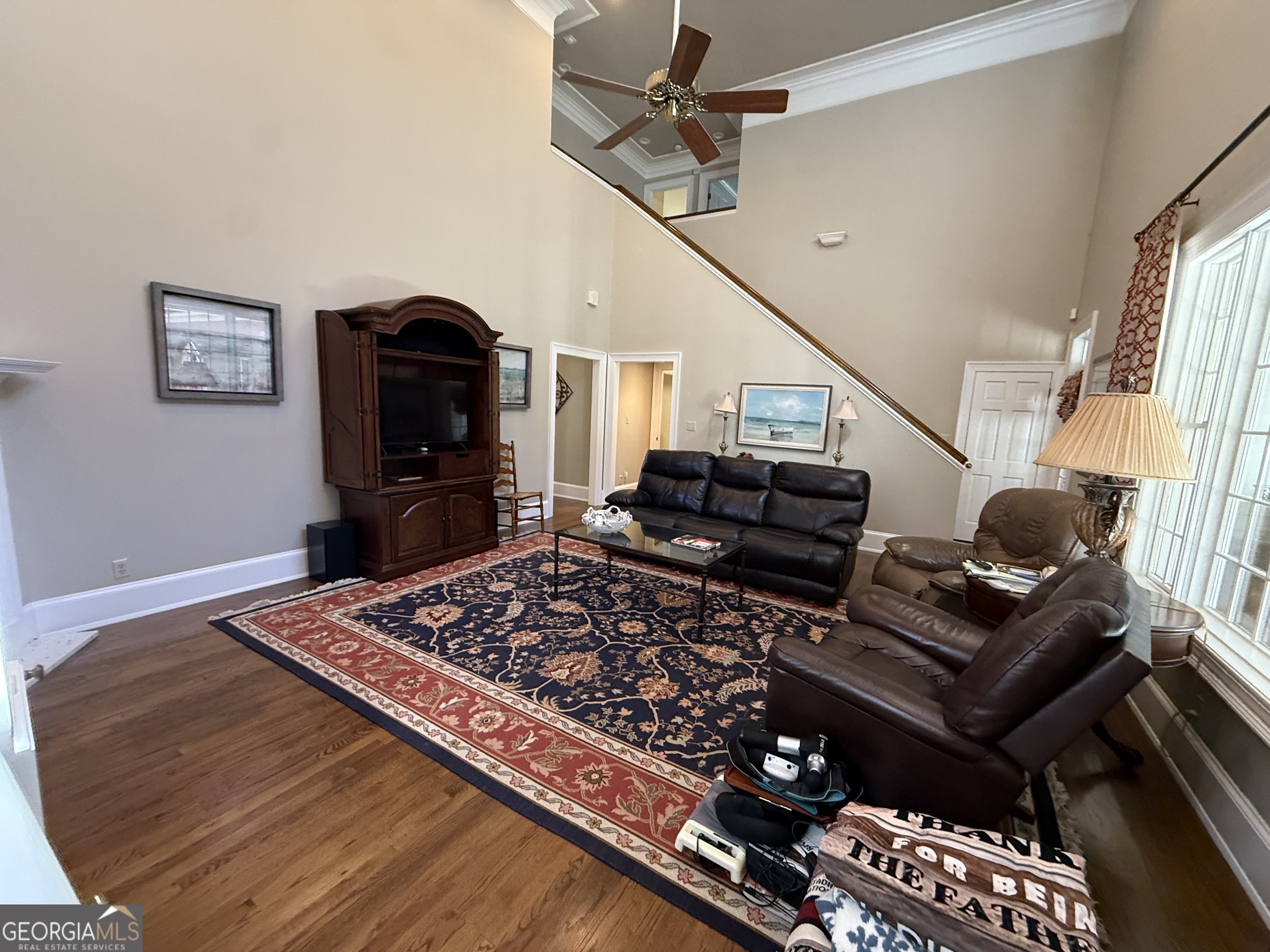 113 Parks Ridge Road Dublin, GA 31021 - Photo 67 of 99 a living room with furniture and a flat screen tv