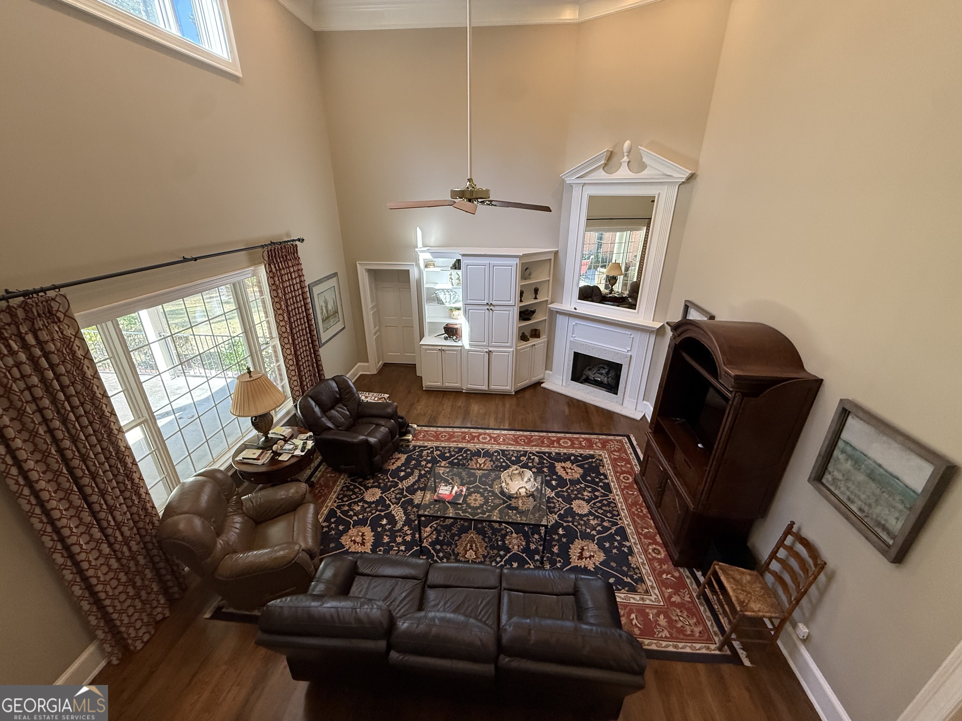 113 Parks Ridge Road Dublin, GA 31021 - Photo 69 of 99 a living room with furniture and a wooden floor