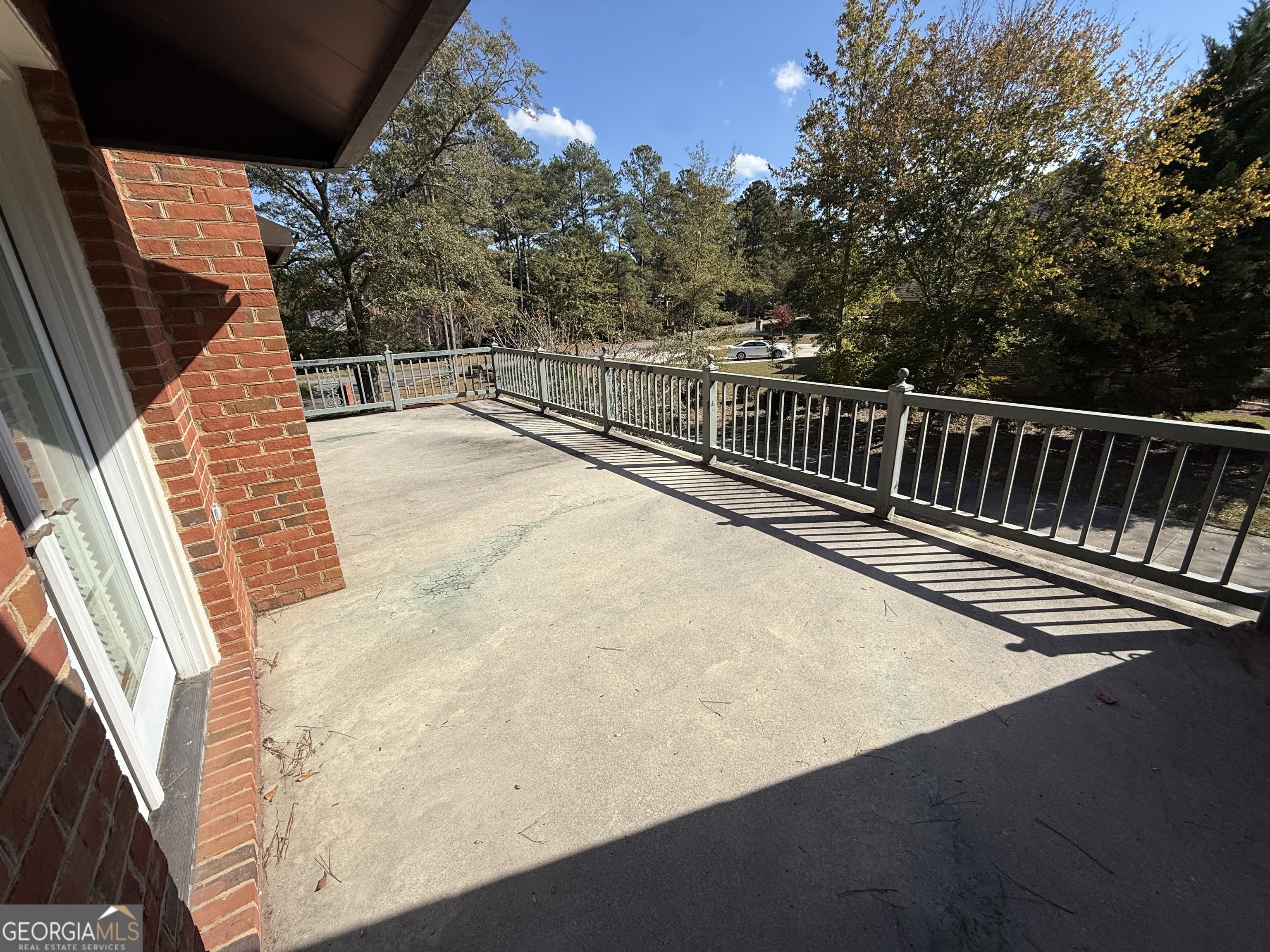 113 Parks Ridge Road Dublin, GA 31021 - Photo 82 of 99 a view of balcony with wooden floor and fence