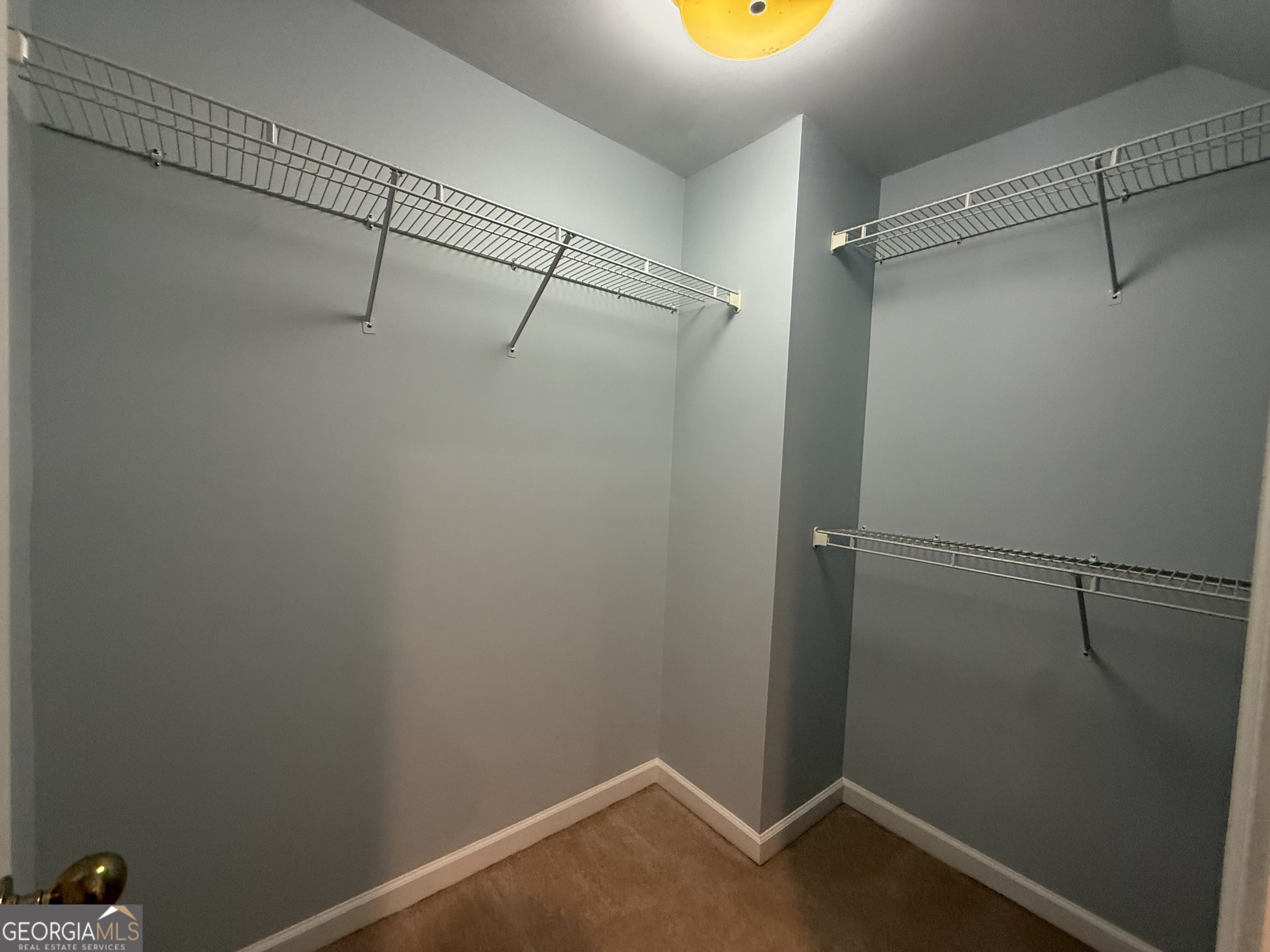 113 Parks Ridge Road Dublin, GA 31021 - Photo 85 of 99 a view of a room with racks on the wall