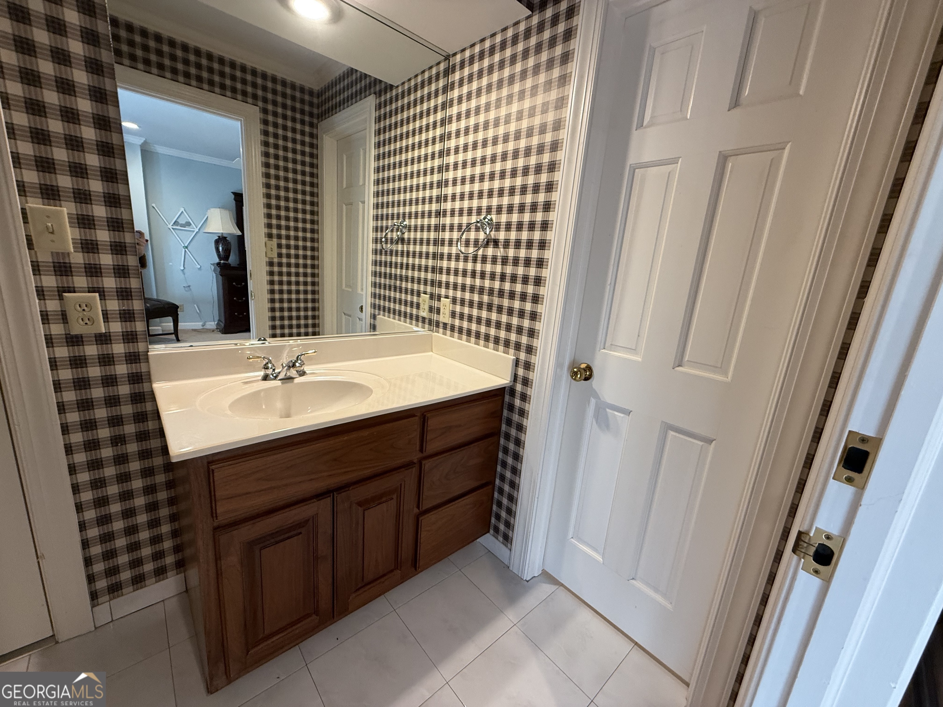 113 Parks Ridge Road Dublin, GA 31021 - Photo 86 of 99 a bathroom with a sink and a mirror