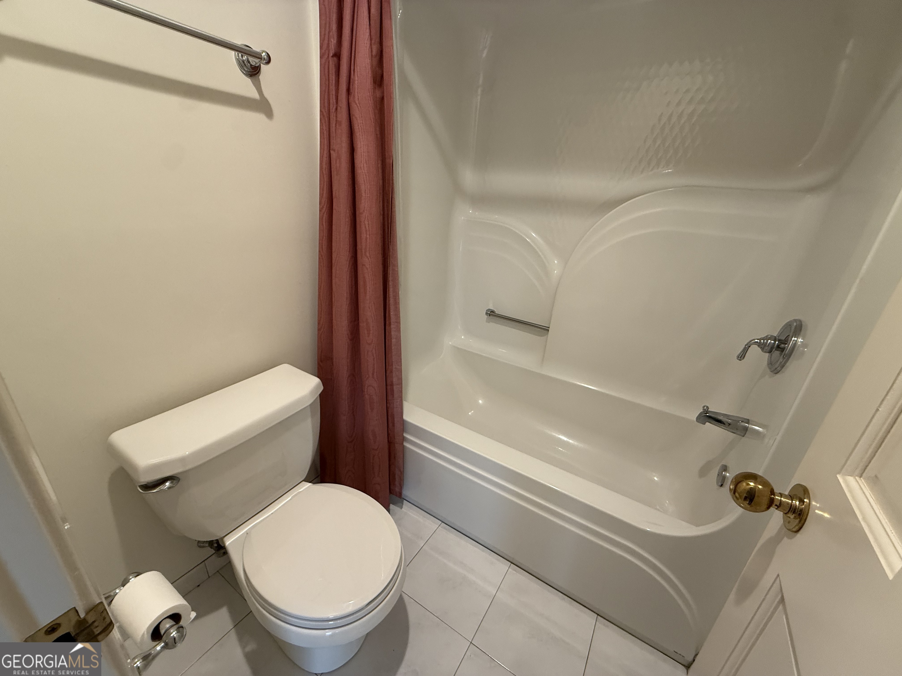 113 Parks Ridge Road Dublin, GA 31021 - Photo 87 of 99 a white toilet sitting next to a bath tub