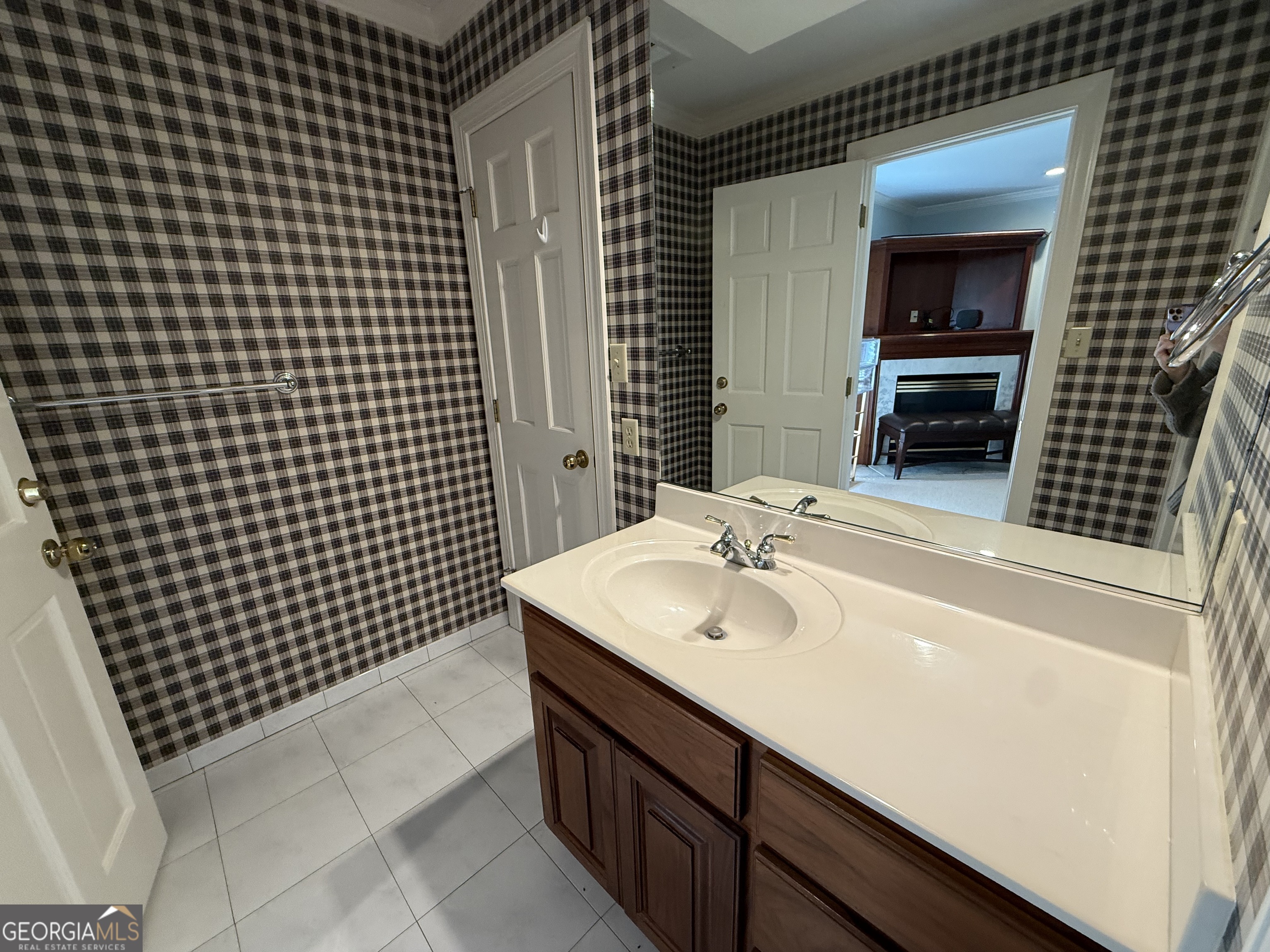 113 Parks Ridge Road Dublin, GA 31021 - Photo 88 of 99 a bathroom with a sink a toilet and mirror