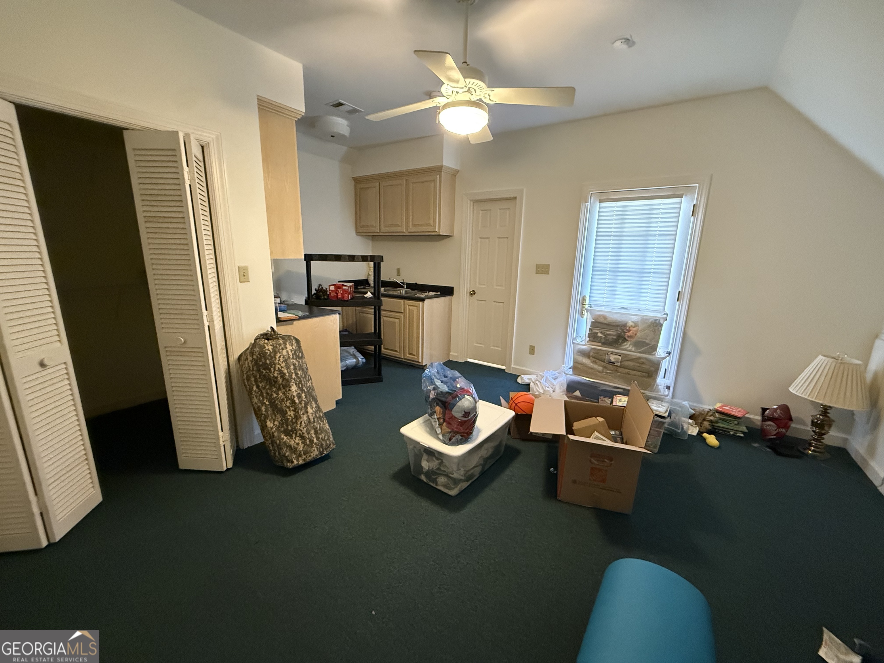 113 Parks Ridge Road Dublin, GA 31021 - Photo 91 of 99 a room with furniture toys and a chandelier