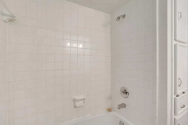 a bathroom with a bathtub