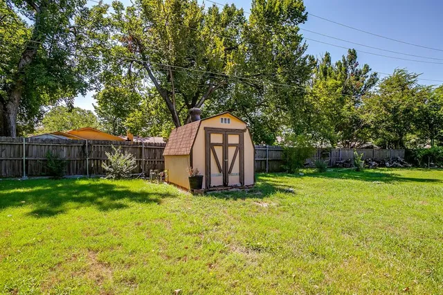 a view of a back yard with green space