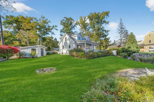 a house with garden in front of it