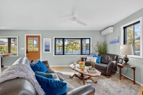 a living room with furniture and window
