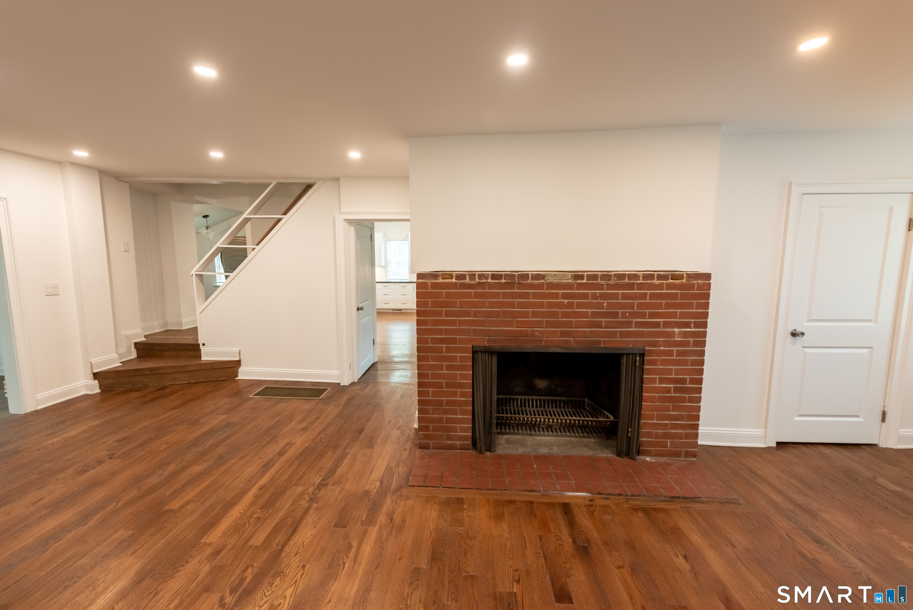 148 Ripton Road Shelton, CT 06484 - Photo 10 of 40 Brick fireplace adds warmth and character