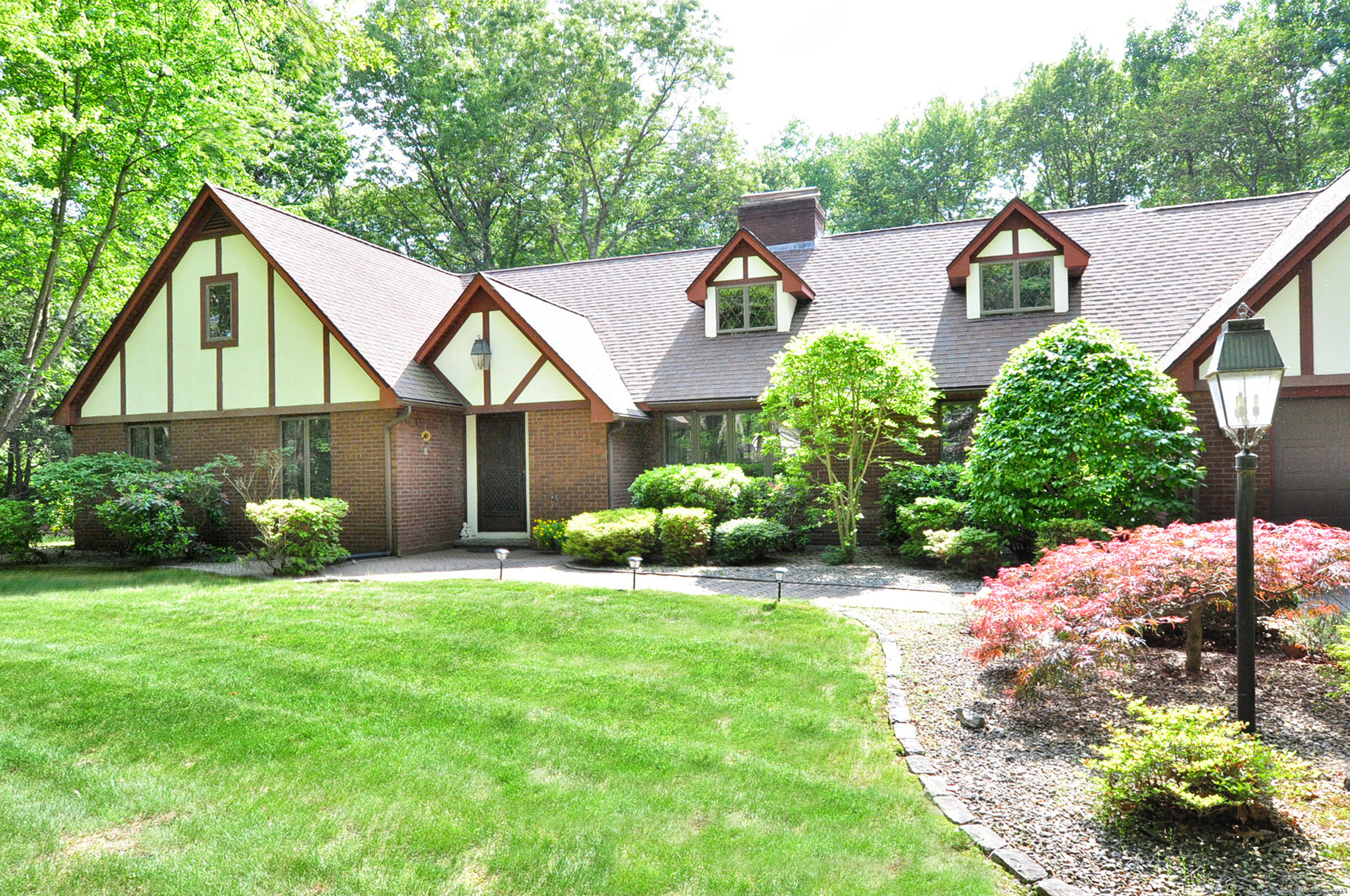 18 Fiano Road Bolton, CT 06043 - Photo 1 of 38 a view of a house with a big yard plants and large trees