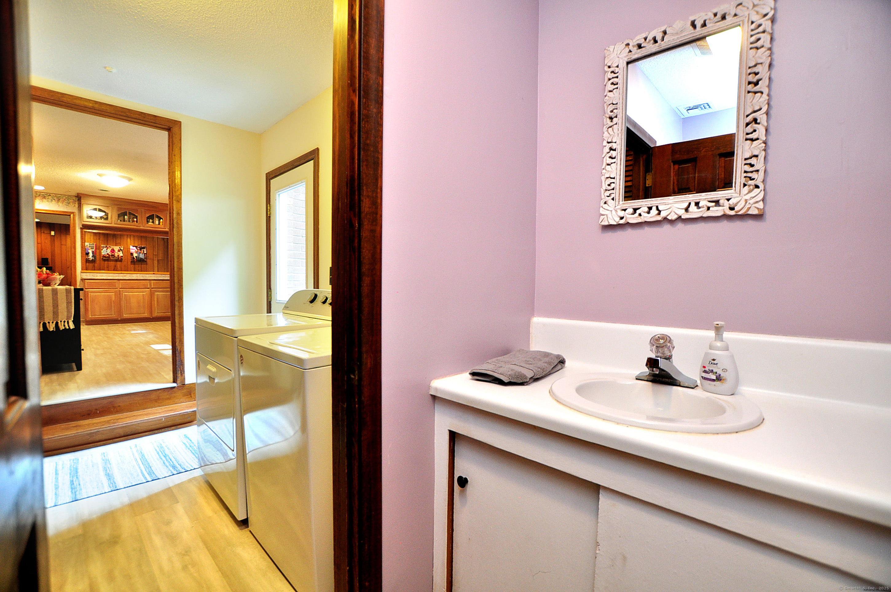 18 Fiano Road Bolton, CT 06043 - Photo 21 of 38 a bathroom with a sink and a mirror